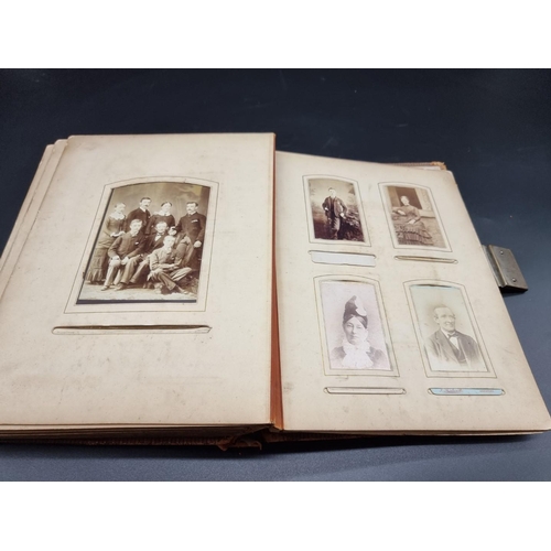 147 - CARTE DE VISITE ALBUM: an album of approx 74 cartes des visite and cabinet cards, loosely inser... 