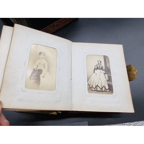 149 - CARTE DE VISITE ALBUMS: a group of 3 19th century albums containing approx 120 cartes des visit... 