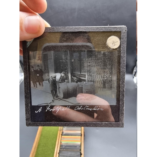 152 - MAGIC LANTERN SLIDES: LONDON STREET CHARACTERS: an unusual group of 50 uncoloured photographic lante... 