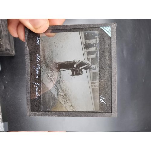 152 - MAGIC LANTERN SLIDES: LONDON STREET CHARACTERS: an unusual group of 50 uncoloured photographic lante... 