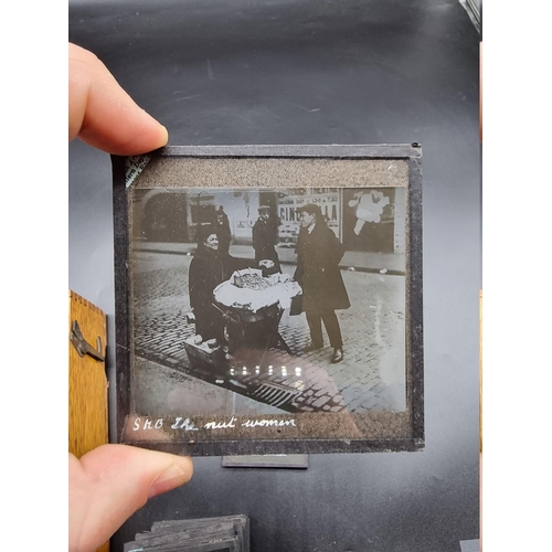 152 - MAGIC LANTERN SLIDES: LONDON STREET CHARACTERS: an unusual group of 50 uncoloured photographic lante... 