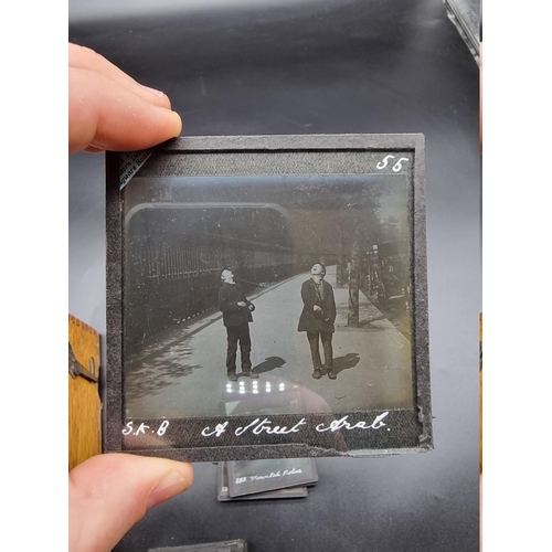 152 - MAGIC LANTERN SLIDES: LONDON STREET CHARACTERS: an unusual group of 50 uncoloured photographic lante... 