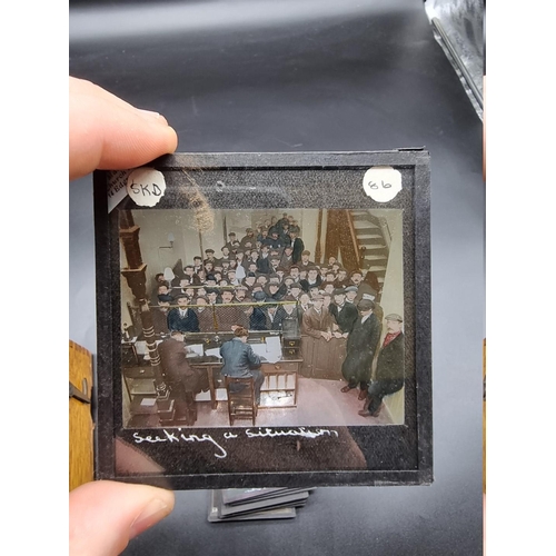 152 - MAGIC LANTERN SLIDES: LONDON STREET CHARACTERS: an unusual group of 50 uncoloured photographic lante... 