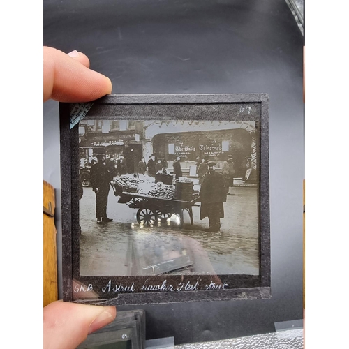 152 - MAGIC LANTERN SLIDES: LONDON STREET CHARACTERS: an unusual group of 50 uncoloured photographic lante... 