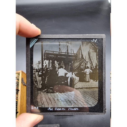 152 - MAGIC LANTERN SLIDES: LONDON STREET CHARACTERS: an unusual group of 50 uncoloured photographic lante... 