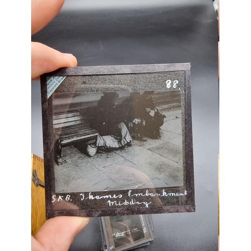 152 - MAGIC LANTERN SLIDES: LONDON STREET CHARACTERS: an unusual group of 50 uncoloured photographic lante... 