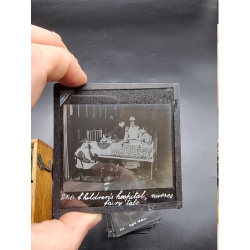 152 - MAGIC LANTERN SLIDES: LONDON STREET CHARACTERS: an unusual group of 50 uncoloured photographic lante... 