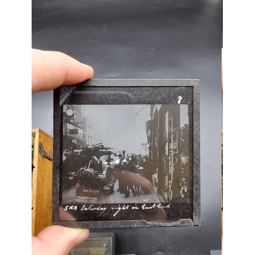 152 - MAGIC LANTERN SLIDES: LONDON STREET CHARACTERS: an unusual group of 50 uncoloured photographic lante... 