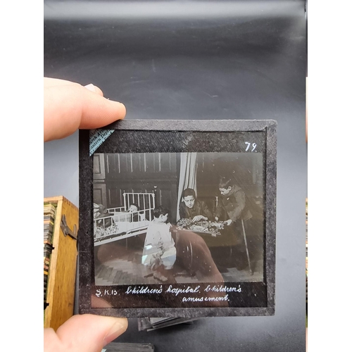 152 - MAGIC LANTERN SLIDES: LONDON STREET CHARACTERS: an unusual group of 50 uncoloured photographic lante... 