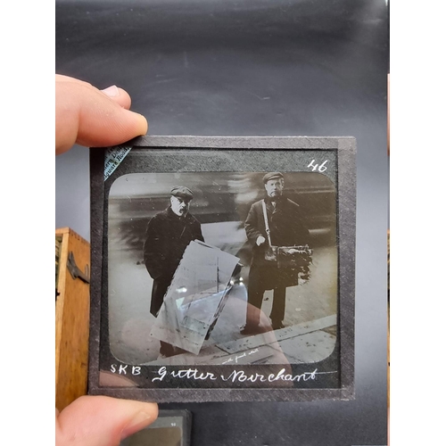 152 - MAGIC LANTERN SLIDES: LONDON STREET CHARACTERS: an unusual group of 50 uncoloured photographic lante... 