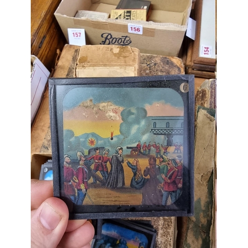 156 - MAGIC LANTERN SLIDES: four small boxes of magic lantern slides, subjects to include Indian muti... 