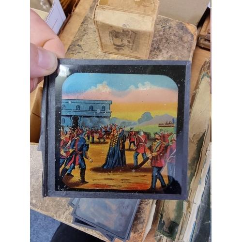 156 - MAGIC LANTERN SLIDES: four small boxes of magic lantern slides, subjects to include Indian muti... 