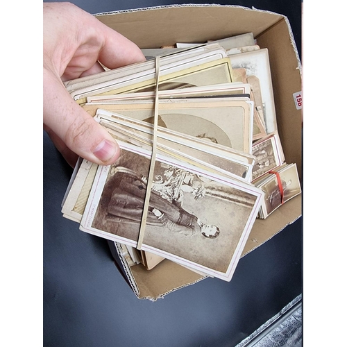 158 - PHOTOGRAPHY: a quantity of mixed 19thc photographic material in one tray, to include carte de v... 