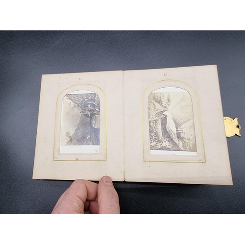 160 - CARTE DE VISITE: a small format cdv album, calf backed mother of pearl boards with engraved brass cl... 