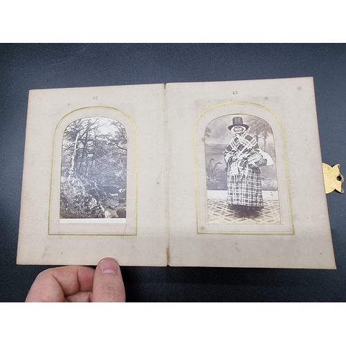 160 - CARTE DE VISITE: a small format cdv album, calf backed mother of pearl boards with engraved brass cl... 