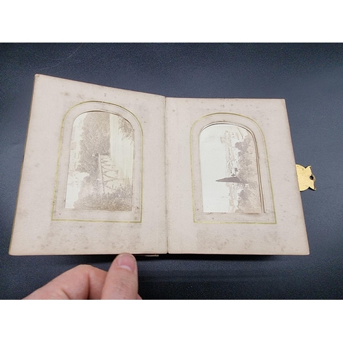 160 - CARTE DE VISITE: a small format cdv album, calf backed mother of pearl boards with engraved brass cl... 