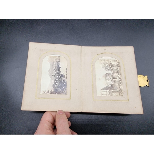 160 - CARTE DE VISITE: a small format cdv album, calf backed mother of pearl boards with engraved brass cl... 