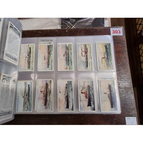 302 - CIGARETTE CARDS: a modern album containing a quantity of cigarette cards, including examples by Mitc... 