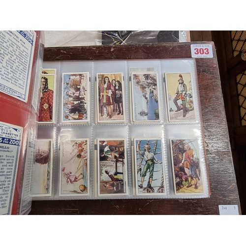 302 - CIGARETTE CARDS: a modern album containing a quantity of cigarette cards, including examples by Mitc... 