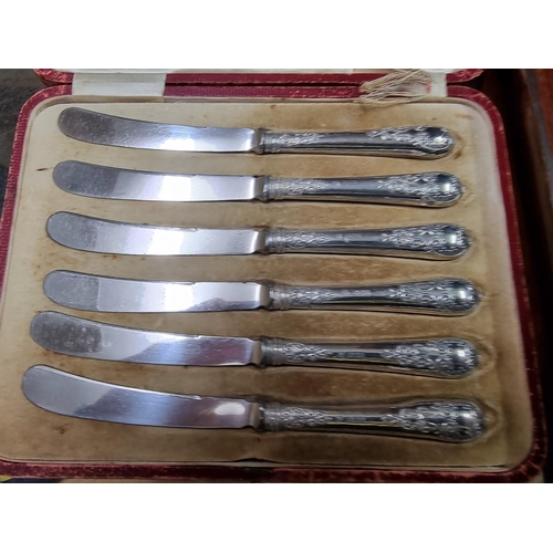 566 - A cased part set of silver handled Kings pattern tea knives and twelve forks, by Harrison Brothers &... 