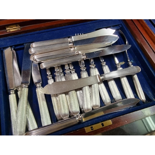 566 - A cased part set of silver handled Kings pattern tea knives and twelve forks, by Harrison Brothers &... 