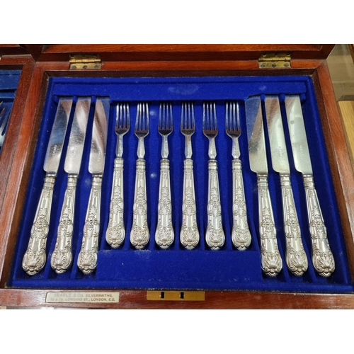 566 - A cased part set of silver handled Kings pattern tea knives and twelve forks, by Harrison Brothers &... 