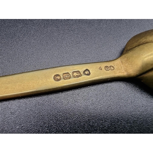 586 - A Victorian silver gilt double ended medicine spoon, by Chawner & Co, London 1871, 13cm, 21g.... 