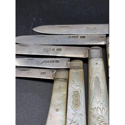 614 - Five Victorian and later silver and mother of pearl folding fruit knives.