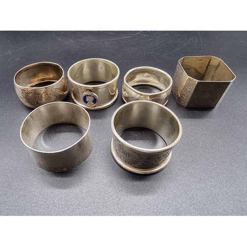 629 - Five various silver napkin rings, 88g; and another metal example. (6)