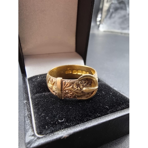 696 - An Edwardian 18ct gold buckle ring, by W.M, Birmingham 1905, size S, 8.5g.