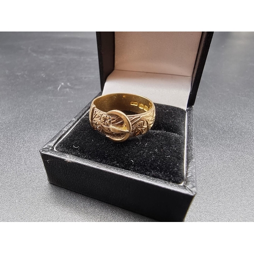 696 - An Edwardian 18ct gold buckle ring, by W.M, Birmingham 1905, size S, 8.5g.