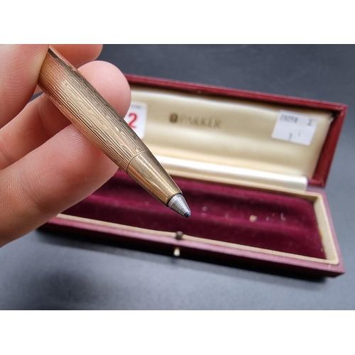 712 - A cased 9ct gold Parker 61 Presidential Waterdrop pattern ball point pen, hallmarked London 1966.... 