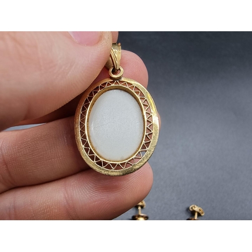 721 - A yellow metal oval pendant set cabochon opal doublet, stamped 750, 2.5cm; together with a pair of s... 