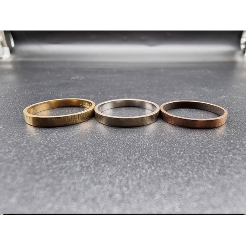 730 - Three 9ct gold wedding bands, all size P, 5.6g.