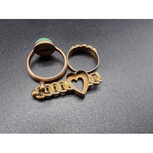 732 - Two yellow metal rings and two other items. (4)