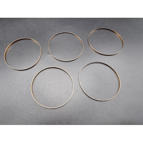 781 - Five 9ct gold bangles, 14.6g.