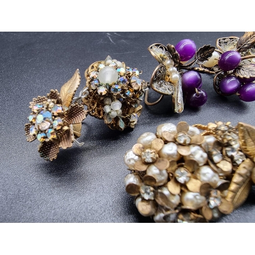 797 - A vintage Miriam Haskell floral brooch, 48mm; together with two pairs of costume ear clips. (5)... 