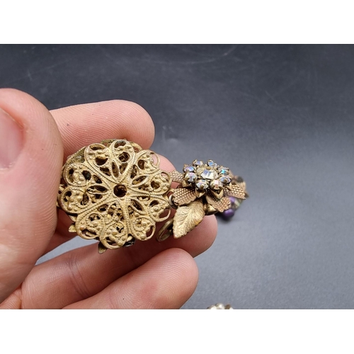 797 - A vintage Miriam Haskell floral brooch, 48mm; together with two pairs of costume ear clips. (5)... 