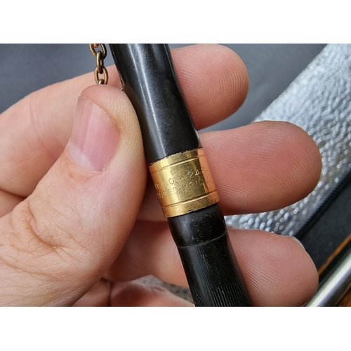 799 - A Mabie Todd & Bard 'Swan' gilt metal mounted fountain pen, 14cm.