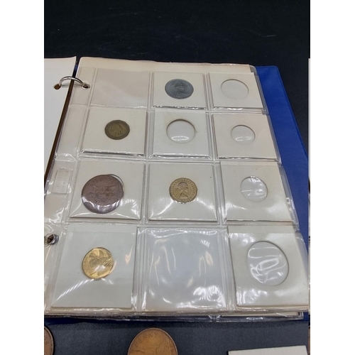 957 - Coins: an album of UK and world coins, to include a George V 1935 rocking horse crown.... 