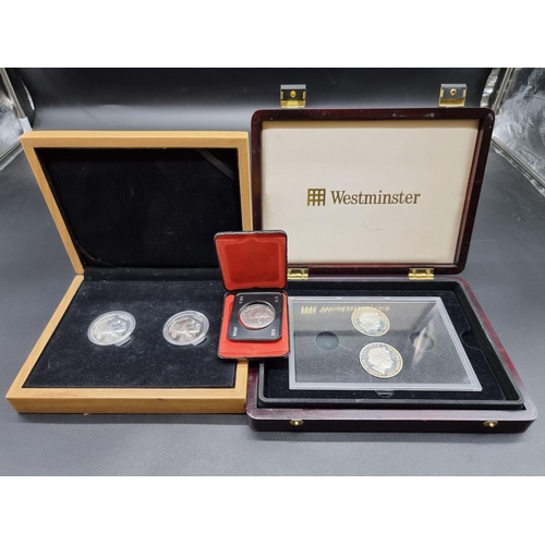 958 - Coins: a cased set of two US 1oz fine silver Indian head medals; together with two Westminster Colle... 