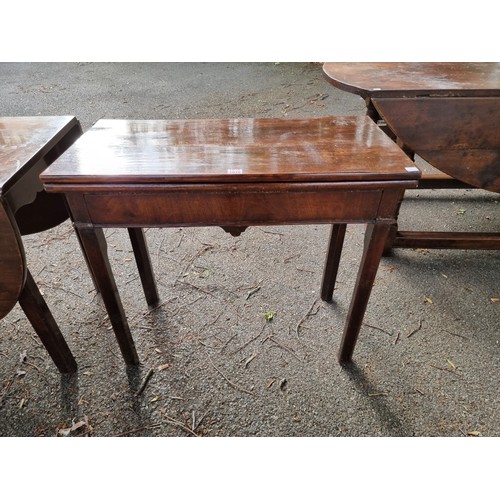 1076 - A George III mahogany tea table, 81cm wide x 72cm high; together with an antique mahogany dropleaf t... 