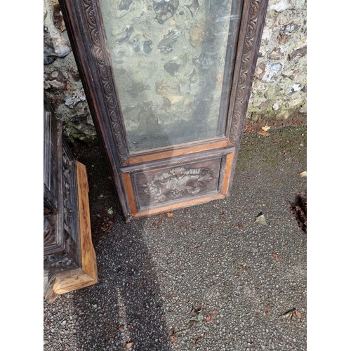 1000 - An antique continental oak two door cupboard, having a pair of glazed doors, 230cm high x 111.5... 