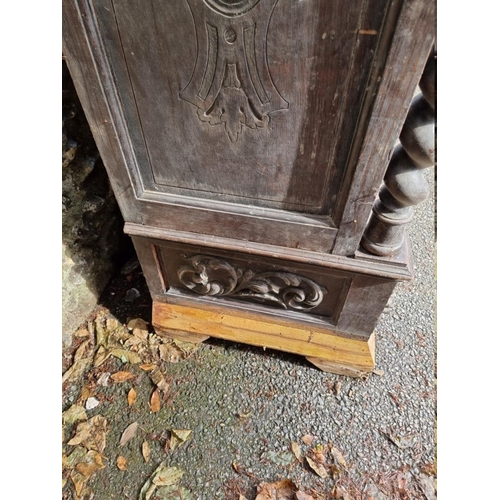 1000 - An antique continental oak two door cupboard, having a pair of glazed doors, 230cm high x 111.5... 