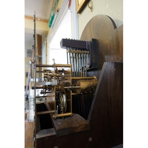 1286 - A good reproduction walnut longcase clock, the 10in arched dial inscribed 'Canham, London', 198cm hi... 