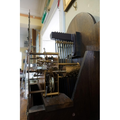 1286 - A good reproduction walnut longcase clock, the 10in arched dial inscribed 'Canham, London', 198cm hi... 