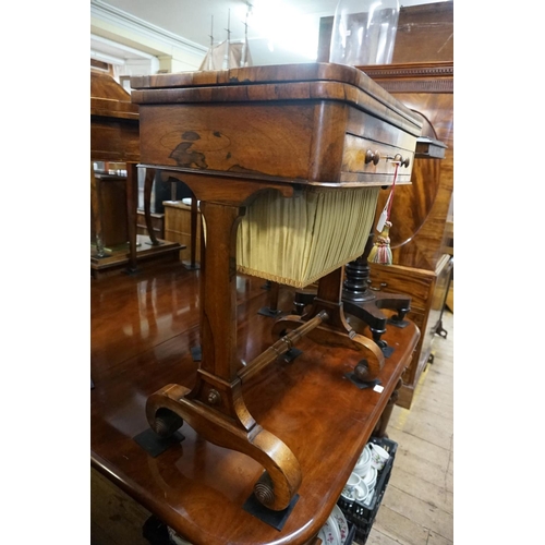 1375 - A Victorian rosewood combination games work table, the foldover top with chequerboard inlay, 78... 