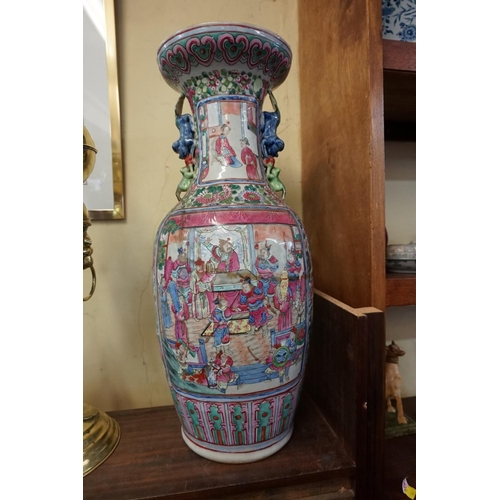 1689 - A large Chinese twin handled famille rose vase, late 19th century, 61.5cm high, (repaired).... 