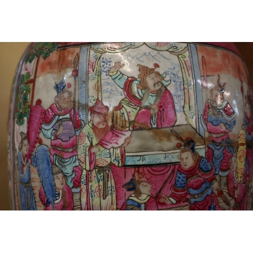 1689 - A large Chinese twin handled famille rose vase, late 19th century, 61.5cm high, (repaired).... 