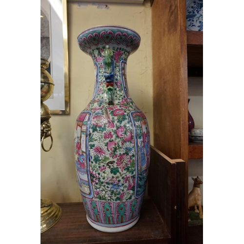 1689 - A large Chinese twin handled famille rose vase, late 19th century, 61.5cm high, (repaired).... 